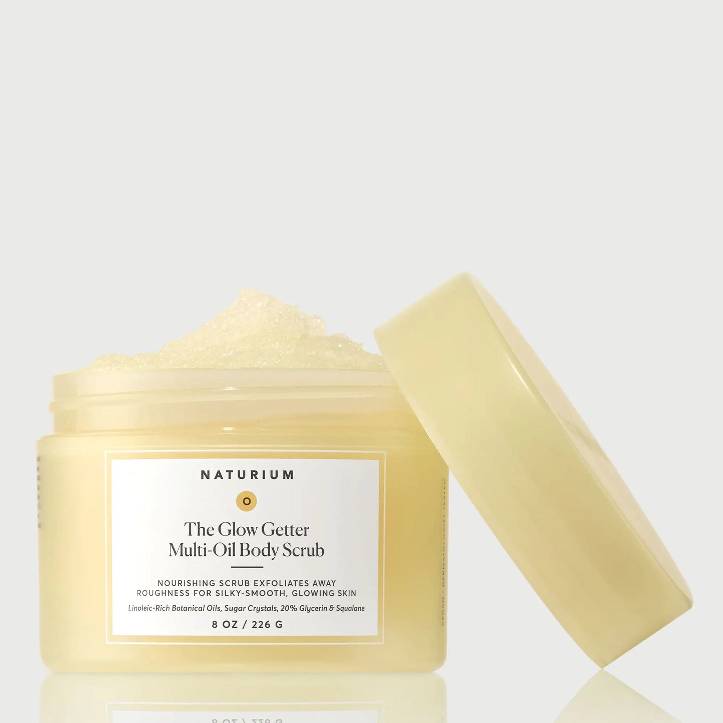 the-glow-getter-multi-oil-body-scrub-o8 NATR-40028-GlowGetter-Multi-Oil-Body-Scrub-Front-CapOff-bonebkgd.webp